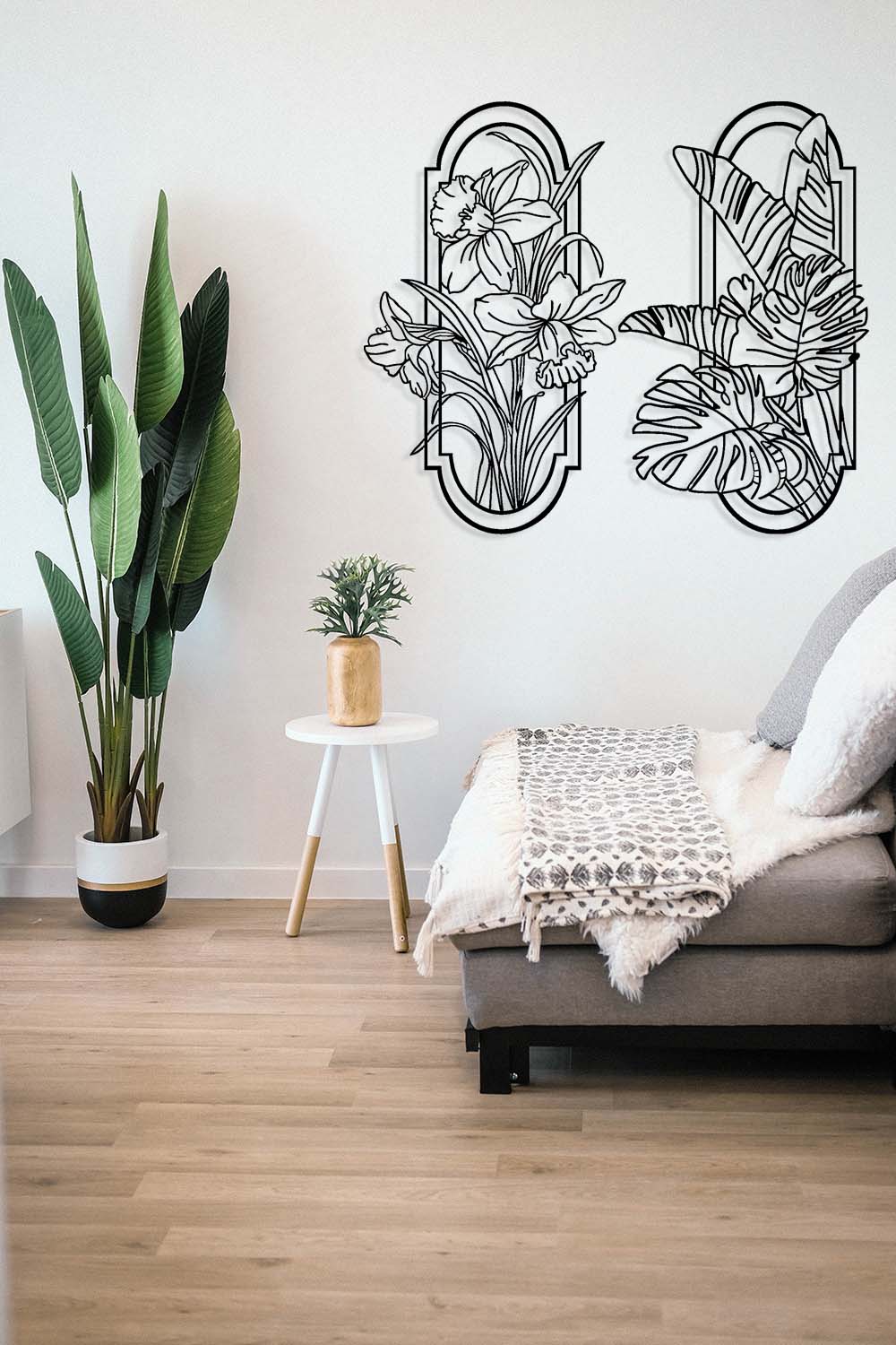Set van 2 metalen botanische panelen. Transformeer een lege hoek in uw woonkamer tot een knusse, stijlvolle leeshoek met deze natuurlijke wanddecoratie.