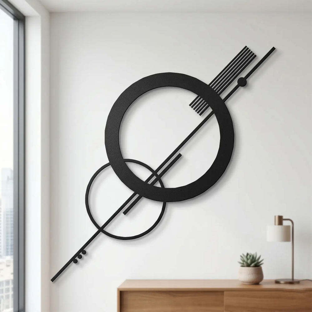 Zwarte metalen Bauhaus wanddecoratie met abstracte cirkels in de hal. Geef uw gasten een architectonisch en modern welkom bij binnenkomst.