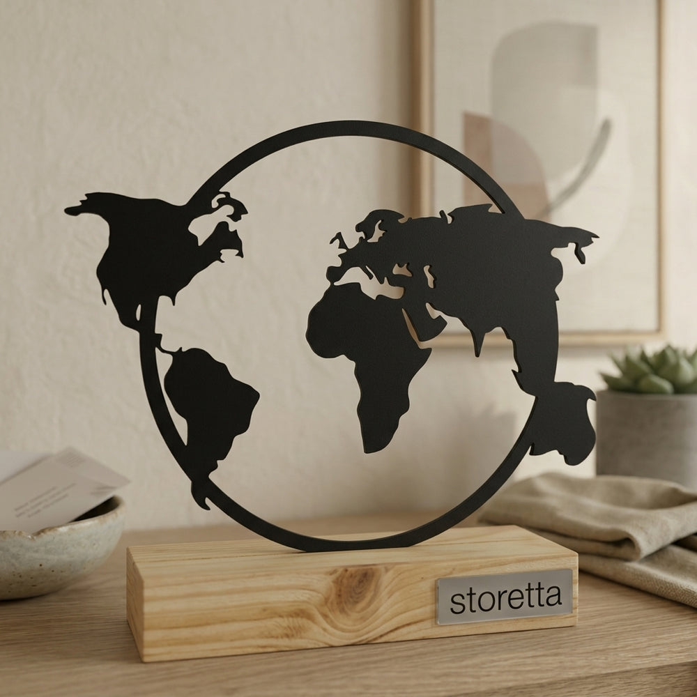 Minimalistisch decoratiebeeld van de wereld, passend bij interieurs met mangohout en zwart staal.