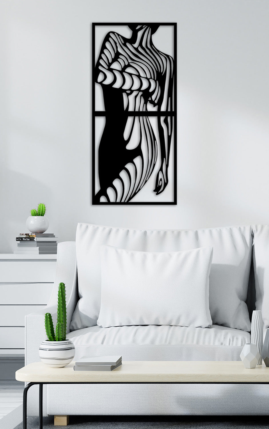 Grote set van 2 metalen wanddecoraties met abstracte vrouw lijnen. Een stijlvolle en warme toevoeging om een alledaagse, gezellige woonkamer direct een moderne uitstraling te geven.
