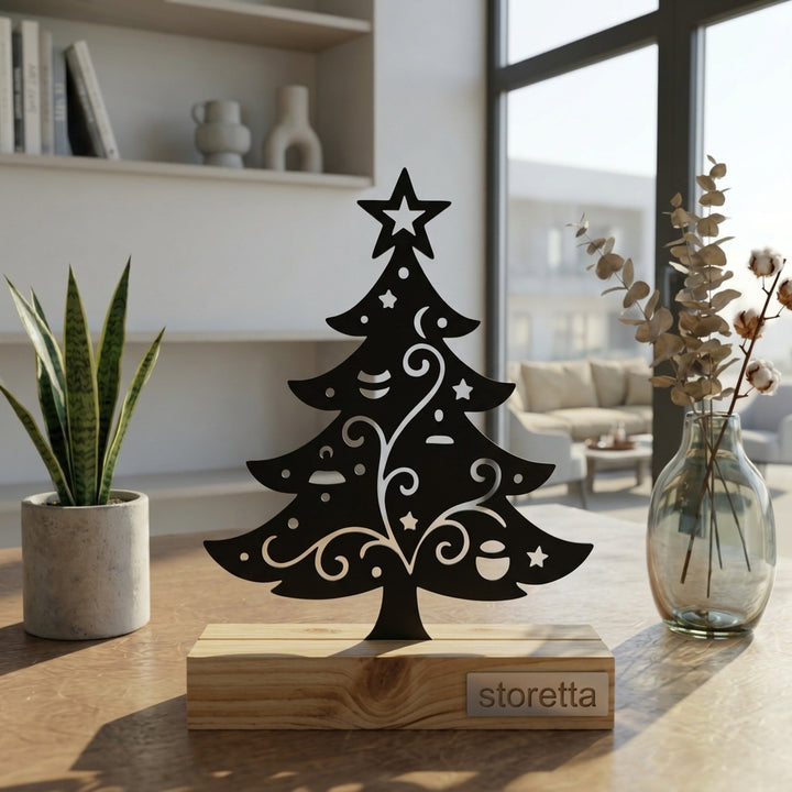 Eigentijdse tafeldecoratie van metaal en hout met een verfijnd kerstboom silhouet in natuurlijk daglicht.