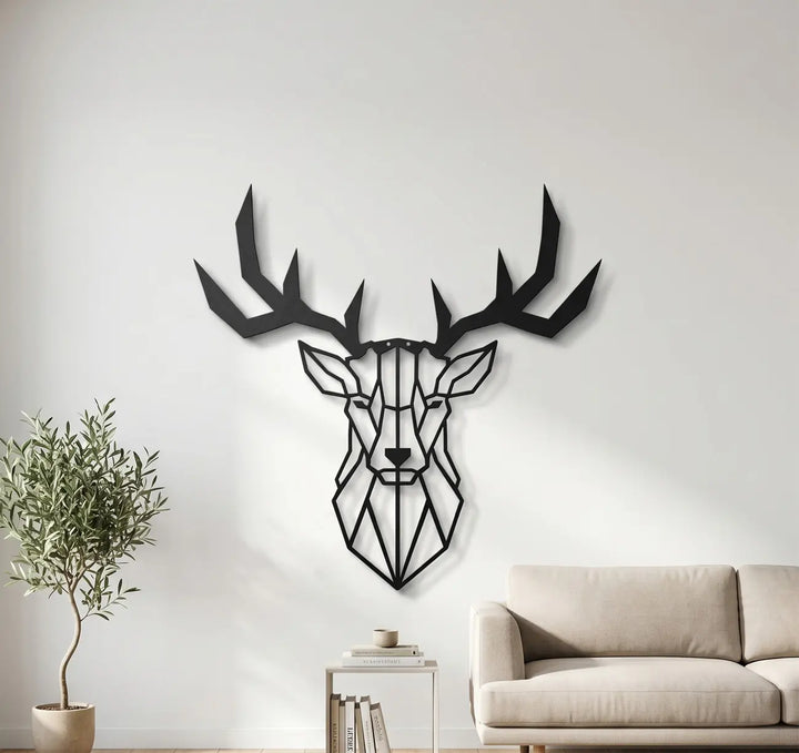 Zwarte metalen geometrische hertenhoofd wanddecoratie. De perfecte diervriendelijke eyecatcher voor een Scandinavisch interieur in de woonkamer.